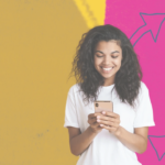 Smiling young woman using a smartphone with donation app interface shown on screen.