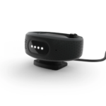Close-up of a black wearable medical device connected to a cable of Gardia.